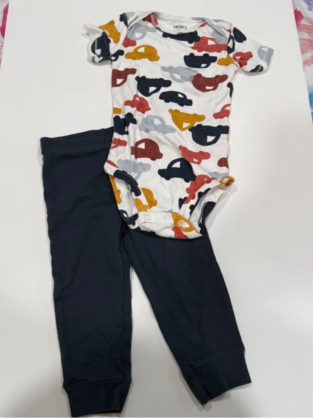 Carter’s two-piece short sleeve shirt and pants cars size 9 to 12 months